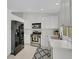 Bright kitchen with modern stainless steel appliances and white cabinetry at 523 Rancho Del Norte Dr, North Las Vegas, NV 89031