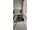 Close-up of a modern kitchen sink with stylish faucet and quartz countertops at 523 Rancho Del Norte Dr, North Las Vegas, NV 89031