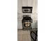 Stainless steel gas range with microwave and white cabinets in updated kitchen at 523 Rancho Del Norte Dr, North Las Vegas, NV 89031