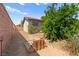Backyard showing the layout with landscaping and privacy wall at 5361 Cabrito Dr, Las Vegas, NV 89103