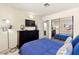 Bedroom with a view to the bathroom and mirrored closet at 5361 Cabrito Dr, Las Vegas, NV 89103