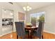 Dining room with hardwood floors, natural light, and open view to other rooms at 5361 Cabrito Dr, Las Vegas, NV 89103