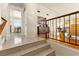 Welcoming split-level entryway showcasing a modern staircase and bright, open living spaces at 5361 Cabrito Dr, Las Vegas, NV 89103