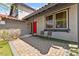 Front porch features pavers and two chairs, perfect for relaxing and enjoying the outdoors at 5361 Cabrito Dr, Las Vegas, NV 89103