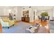 Spacious living room with hardwood floors, a zebra rug, and natural lighting at 5361 Cabrito Dr, Las Vegas, NV 89103
