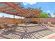Outdoor pergola with dining area and comfortable seating, ideal for entertaining at 5361 Cabrito Dr, Las Vegas, NV 89103