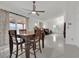 Open dining space with easy access to the living room and sliding door to the backyard at 5512 Kettering Pl, Las Vegas, NV 89107