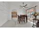 Dining area featuring backyard access and a view to the kitchen at 5512 Kettering Pl, Las Vegas, NV 89107