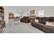 Spacious living room features a fireplace, neutral color palette, and tile flooring at 5512 Kettering Pl, Las Vegas, NV 89107