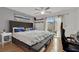 Spacious main bedroom with a sliding glass door for backyard access, as well as a ceiling fan at 5512 Kettering Pl, Las Vegas, NV 89107