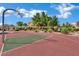 Community basketball court surrounded by mature landscaping and benches at 6525 Bismark Hills St, North Las Vegas, NV 89084