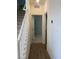 Inviting entryway featuring hardwood floors and a staircase leading to the upper level at 6574 Tumoulin St, Las Vegas, NV 89148