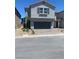 Charming two-story home with a paved driveway and well-maintained landscaping at 6574 Tumoulin St, Las Vegas, NV 89148
