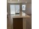 Modern kitchen featuring a large island with a sink and stylish countertops at 6574 Tumoulin St, Las Vegas, NV 89148