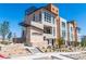 Modern building entrance with attractive desert landscaping, steps leading up to an inviting community entrance at 664 Agate Bridge St, Las Vegas, NV 89138