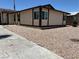 Well-maintained single-story home featuring desert landscaping and manicured lawn at 681 Pine Ridge Dr, Las Vegas, NV 89110