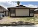 Modest single-story home featuring a low-pitched roof and minimal landscaping in the front yard at 681 Pine Ridge Dr, Las Vegas, NV 89110