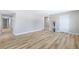 Spacious living area boasting stylish floors and seamless transition to the hallway at 681 Pine Ridge Dr, Las Vegas, NV 89110