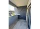 Balcony with view to building exterior and parking at 6955 N Durango Dr # 1038, Las Vegas, NV 89149