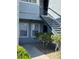 Exterior building elevation with stairs to entry doors at 6955 N Durango Dr # 1038, Las Vegas, NV 89149