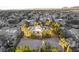 An aerial perspective of a desert residence surrounded by flourishing landscaping in a quiet neighborhood at 7185 Ranchito Cir, Las Vegas, NV 89120
