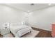 Neutral bedroom featuring a large bed, hardwood floors and modern bedside tables at 7185 Ranchito Cir, Las Vegas, NV 89120