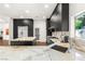 Spacious kitchen with marble countertops, modern appliances, and stainless steel sink at 7185 Ranchito Cir, Las Vegas, NV 89120