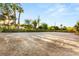 Expansive lot featuring mature landscaping and ample space for development at 7185 Ranchito Cir, Las Vegas, NV 89120