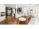 Open floor plan with dark wood floors and dark colored cabinets at 7185 Ranchito Cir, Las Vegas, NV 89120