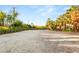 Large lot showcasing mature landscaping and development potential at 7185 Ranchito Cir, Las Vegas, NV 89120