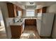 Bright kitchen with laminate countertops and white appliances at 7300 Pirates Cove Rd # 2045, Las Vegas, NV 89145