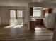 Spacious living room with dining area and kitchen visible in the background at 7300 Pirates Cove Rd # 2045, Las Vegas, NV 89145