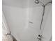 Clean shower with a white tub and shower head on the wall at 7300 Pirates Cove Rd # 2045, Las Vegas, NV 89145