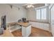 Spacious office complete with custom built-in desk and cabinets at 7473 Crystal Clear Ave, Las Vegas, NV 89113