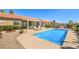 Backyard pool and spa with ample decking, patio seating, and desert landscaping at 7473 Crystal Clear Ave, Las Vegas, NV 89113