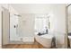 Beautiful bathroom with a standalone tub, glass shower, and contemporary design at 7825 Desert Bell Ave, Las Vegas, NV 89128