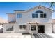 Well-maintained two-story home with a terracotta tile roof, desert landscaping, and inviting curb appeal at 7825 Desert Bell Ave, Las Vegas, NV 89128