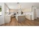 Bright kitchen with center island, white countertops, and stainless steel appliances at 7825 Desert Bell Ave, Las Vegas, NV 89128