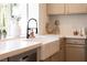Modern farmhouse sink featuring a spring faucet and beautiful backsplash tiles at 7825 Desert Bell Ave, Las Vegas, NV 89128