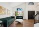 Bright living room featuring high ceilings, modern decor, and lots of natural light at 7825 Desert Bell Ave, Las Vegas, NV 89128
