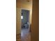 View of the toilet in a bathroom with tiled floors and neutral walls at 8052 Marbella Cir, Las Vegas, NV 89128