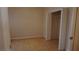 Cozy bedroom with wood-look floors, closet, and ample natural light at 8052 Marbella Cir, Las Vegas, NV 89128
