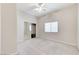 Neutral bedroom with window and mirrored closet at 8052 Marbella Cir, Las Vegas, NV 89128