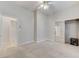 Neutral bedroom with sliding mirrored closet and ceiling fan at 8052 Marbella Cir, Las Vegas, NV 89128