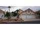 Charming single-story home featuring a two-car garage and well-maintained landscaping at 8052 Marbella Cir, Las Vegas, NV 89128