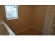 Partial view of a laundry room with a small sink and natural light at 8052 Marbella Cir, Las Vegas, NV 89128
