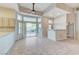 Cozy eat-in kitchen adjacent to the living room with sliding glass doors to the backyard patio at 8052 Marbella Cir, Las Vegas, NV 89128