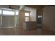 Open living room with bright window and breakfast bar at 8052 Marbella Cir, Las Vegas, NV 89128