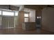 Open living room with bright window and breakfast bar at 8052 Marbella Cir, Las Vegas, NV 89128