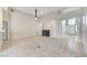 Inviting living area with tile floors, fireplace, and bright entryway, perfect for welcoming guests at 8052 Marbella Cir, Las Vegas, NV 89128